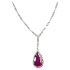 Ruby 9.23 carats with Diamond 2.77 carats Necklace set in 18 Karat White Gold Settings Width: 1.8 cm Length: 49.0cm Total Weight: 19.96 grams "We first opened doors in 1980 when it was then situated in the vicinity of the Victory Monument; a small and modest storefront with a couple of counters. From its humble beginnings to where it stands today, our company has proven its abilities as a jeweler. Since the beginning, we have been supplying fine quality pieces to dealers, wholesalers and custome Luxury Ruby Necklace With Brilliant Cut, Exquisite Gemstone Necklace For Formal Occasions, Exquisite Gemstone Necklaces For Formal Occasions, Formal Hallmarked Pear-shaped Necklace, Formal Pear-shaped Gemstone Necklaces, Formal Pear-shaped Gemstone Necklace, Formal Pear-shaped Diamond Necklace, Formal Hallmarked Teardrop Necklace, Luxury Diamond Gemstone Necklace For Formal Occasions