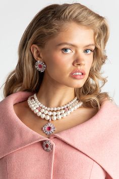 A pearl necklace, but make it royal. The Emily Pearl Necklace deserves all the attention with the three-layer pearl chain and diamond details that sparkle in the light. Bronze plated gold Cubic oxidation Crystal glass Pearl Necklace Pink, Nana Jacqueline, House In London, Skirt Satin, Lapel Jacket, Bold Earrings, Decorative Buttons, Earrings Pink, Three Layer