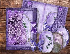 purple paper with laces and flowers on wooden background, digital collager stock photo