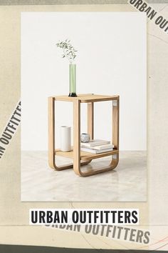 an advertisement for urban outfitters featuring a vase with flowers in it