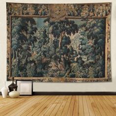 a tapestry hanging on the wall in an empty room