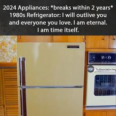 a refrigerator freezer sitting in the middle of a kitchen next to a stove top oven