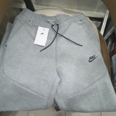 Nike Tech Slim Fit Taper Leg Sweatpants Very Comfortable With Tags Brand New With Tags Make It Yours Today Nike Sportswear Bottoms With Pockets, Nike Gray Pants With Pockets, Nike Long Pants For Winter, Nike Casual Gray Bottoms, Swag Hats, Cute Nike Outfits, Pants Nike, Nike Sweats, Shopping Clothes