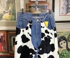 "Vintage 80's blue cotton faded denim jeans with cow print faux fur on front hips Front & back pockets  * discoloration back left leg - see photo     Measurements in inches: 32\" waist  27\" inseam  24\" thigh 1/2\" hem 38\" side waist to hem  11\" front rise  16\" back rise  7\" zipper" Cow Print Jeans, Print Jeans, Photo Dimensions, Faded Denim, Blue Denim Jeans, Cow Print, Black Jacket, Women Pullover, Vest Jacket