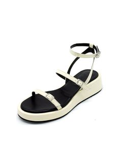 Editor's NoteBuckle strap platform sandals will complete your summer outfit- Simple strappy sandals- Designed with chic almond toe- Adjustable ankle strap to find the most comfortable fit- Contrast color insole- Perfect for summerMeasurement (inch)- KR220(US 5)-KR255(US 8.5)- Height 1.4in.* Fits true to the size* Please refer to the size chartComposition & Care- Cow Skin (Cream) + Lamb Skin (Black)* Deformation or discoloration might happen if in contact with humid air or high temperature* A Modern Wedge Heel Sport Sandals For Summer, Modern Sport Sandals With Wedge Heel For Summer, Summer Ankle Strap Slingback Sandals With Heel Loop, Platform Sport Sandals With Open Heel For Summer, Summer Sport Sandals With Platform And Open Heel, Modern Wedge Sandals With Ankle Strap For Summer, Summer Wedge Sandals With Single Toe Strap And Platform, Summer Wedge Heel Footbed Sandals With Heel Loop, Modern Ankle Strap Wedge Sandals For Summer