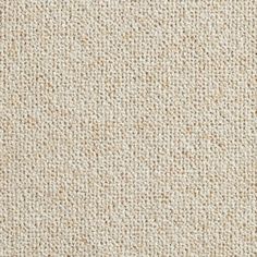 an up close shot of the texture of a beige carpet with white and tan colors