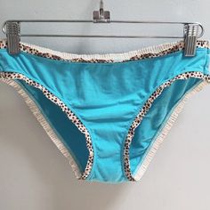 Victoria's Secret Vintage Bikini Panty Size L Blue Stretch Bottoms For Poolside, Victoria's Secret Light Blue Bottoms For Summer, Victoria's Secret Blue Bottoms For Summer, Victoria's Secret Blue Summer Bottoms, Light Blue Swimming Briefs, Light Blue Stretch Bottoms For Beach Season, Vacation Blue Brief Bottoms, Victoria's Secret Blue Beach Bottoms, Victoria's Secret Beach Brief Bottoms