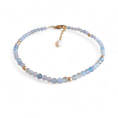 Beautifully handcrafted aquamarine  Gemstone semi precious stone anklet with genuine freshwater pearl set in 14k gold filled.  Ankle bracelet. FEATURES  Genuine Gemstone,  semi precious stone,  aquamarine  smooth  beaded anklet    Genuine freshwater pearl Set in 14k gold filled, non tarnish, nickel free and hypoallergenic. March Birthstone  Handcrafted in Hawaii by Aupolei  3mm Bead size ( tiny, dainty, minimalist  )  and pearl size is approx. 3 x 5 mm  Stones used are natural which makes every piece unique and one of a kind and therefore have natural inclusions. Handmade Bohemian  ( boho ) jewelry Comes in a jewelry box ready for gifting. A perfect gift for her, best friend gift, mothers Day, birthday, anniversary, daughter, sister, wife, girlfriend. 14k gold filled is a generally higher Stone Anklet, Crystal Aquamarine, Anklet For Women, Beaded Anklet, Gift For Her Birthday, March Birthstone, Ankle Bracelet, Pearl Set, Aquamarine Gemstone