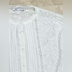 Very Beautiful And Delicate Blouse It Has Very Fine Sparkle Lines You Can Dress It Up Or Dress It Down It’s A Little Cropped Summer Daywear Shirt With Broderie Anglaise, Summer Broderie Anglaise Shirt For Daywear, Casual Broderie Anglaise Shirt For Daywear, Elegant White Shirt With Broderie Anglaise, Long Sleeve Blouse With Broderie Anglaise For Day Out, White Feminine Shirt For Day Out, Feminine White Shirt For Day Out, Zara Broderie Anglaise Blouse For Spring, Zara Broderie Anglaise Blouse