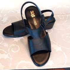 Sas Suntimer- Heeled Leather Sandals Nwot Premium Leather Adjustable Velcro Strap Slingback Sas Tripad Comfort Insoles Black Size 10.5 M Heel 1.625" Nwot Comfort Sas Sandals Can Be Worn With Dresses, Pants, Or Shorts. A Comfortable Addition To Your Wardrobe!!! Classic Closed Toe Sandals With Ortholite Insole, Classic Slip-on Sandals Medium Width, Black Leather Footbed Slip-on Slingback Sandals, Black Slingback Sandals With Cushioned Footbed And Round Toe, Black Synthetic Closed Toe Slingback Sandals, Black Slingback Sandals With Leather Sole And Round Toe, Classic Black Round Toe Sandals, Classic Sandals With Ortholite Insole And Round Toe, Classic Black Slingback Sandals With Round Toe