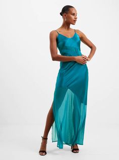 A sultry and sophisticated summer favorite. Our Inu Satin Strappy Mesh Maxi Dress takes a slinky slip dress silhouette and pairs it with a smooth and glossy satin construction with modern mesh elements for a flirty finish. This dress is hosted by adjustable spaghetti straps and a playful v-neckline, whilst its maxi length skirt stands out from the crowd in further mesh accompanied by a lively side split. Slip dress Fabric: smooth, glossy, satin, mesh, orange Sleeveless Adjustable spaghetti strap Strappy Maxi Dress, Mesh Maxi Dress, Summer Favorites, Dress Silhouette, Side Split, Dress Fabric, Spaghetti Strap, Slip Dress, Spaghetti