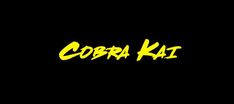 the word cobra kit written in yellow on a black background