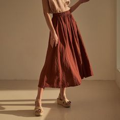 A Line Linen Skirt, Terracotta Skirt Outfit, Bohemian Linen Gathered Maxi Skirt, Summer Voluminous Linen Maxi Skirt, Voluminous Linen Maxi Skirt For Summer, Summer Linen Voluminous Maxi Skirt, Relaxed Linen Maxi Skirt, Linen Tiered Maxi Skirt With Elastic Waistband, Linen Maxi Skirt With Elastic Waistband And Wide Leg