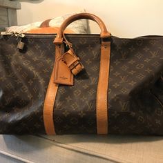 Louis Vuitton Malletier Carryall Luggage Duffel Bag. In Good Condition Considering It Is Over 30 Years Old. Very Clean. The Zipper Area Is Pulling Apart Slightly, That Is Where The Most Wear Is. Gold Hardware See Pictures. Brown Leather Trim Bag For Everyday Luxury, Designer Brown Coated Canvas Travel Bag, Brown Designer Coated Canvas Travel Bag, Designer Brown Luggage, Designer Brown Luggage For Business, Designer Brown Business Luggage, Luxury Brown Coated Canvas Luggage, Business Brown Monogram Canvas Luggage, Designer Brown Luggage With Leather Handles