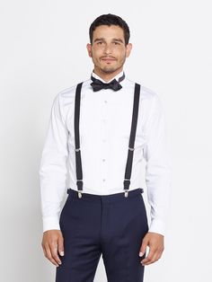 Suspenders are the essential choice for a classic black tie look. These are cut slimmer for a clean, streamlined effect.  Leather and Elastic 1” wide Dapper Tailored Tuxedo For Work, Fitted Wool Suits For Party, Tailored Wool Suits For Party, Fitted Wool Suit For Party, Elegant Wool Suits For Party, Formal Long Sleeve Suit For Party, Elegant Suits With Bow Tie For Black Tie Event, Classic Suits With Bow Tie For Party, Classic Party Suits With Bow Tie