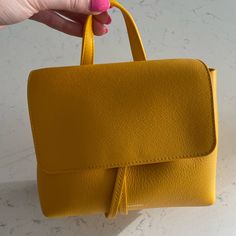 Yellow Mansur Gavriel Bag With Dust Bag And Strap. Tags Still Attached. Selling Because I Haven’t Reached For It Since Buying It Last Summer. Price Negotiable Within Reason. I Will Include The Farfetch Receipt With Purchase And Poshmark Will Authenticate It For Free. Classic Yellow Shoulder Bag With Detachable Handle, Classic Yellow Satchel With Top Carry Handle, Classic Yellow Satchel With Detachable Handle, Classic Yellow Shoulder Bag With Top Carry Handle, Classic Yellow Top Handle Bag, Classic Yellow Bag With Removable Pouch, Classic Yellow Bags With Removable Pouch, Chic Yellow Shoulder Bag With Top Carry Handle, Yellow Satchel With Adjustable Strap