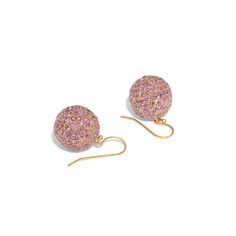 The Story A stunning pair of dangle earrings made during the late 20th century. Filled to the brim with 374 pink sapphires in the most beautiful color, all pave set they create a uniform look. Each earrings has 187 sapphires ranging in size from 3 mm down to 2 mm each. Set in 14 karat rose gold, the pink of these earrings is outstanding. When worn, the balls dance and move giving them an incredible amount of sparkle and shine. Measuring 1.12 inches in length, they hang on 14k rose gold hooks. Go Luxury Pink Sapphire Earrings, Luxury Pink Pierced Earrings, Luxury Pink Round Earrings, Luxury Pink Drop Earrings, Pink Earrings With Sparkling Stones In Fine Jewelry Style, Fine Jewelry Pink Earrings With Sparkling Stones, Pink Diamond Earrings For Pierced Ears, Dazzling Pink Round Earrings, Luxury Pink Dangle Earrings