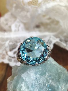 Sky blue Aquamarine Crown Ring, Round Full Cut Gemstone, Sterling Silver Filigree Victorian Reproduction Jewelry, Vintage Jewelry, Silver Embrace Jewelry, D08 Crown Ring Crown, Blue Aquamarine Ring, Crown Design, Silver Crown, Crown Ring, Aquamarine Jewelry, Aquamarine Ring, Filigree Design, Classic Jewelry