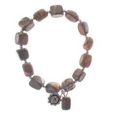 "Find the John Bead Jasper Gray Natural Stone Stretch Bracelet with Flower Charm at Michaels. com. This handmade bead bracelet, made using dyed gray jasper beads and a silver flower charm, will make a fantastic addition to your accessory collection. Called the stone of fairness and justice, jasper is a beloved stone that adds instant polish to any ensemble. This handmade bead bracelet, made using dyed gray jasper beads and a silver flower charm, will make a fantastic addition to your accessory c Jasper Beads, Bracelets Handmade Beaded, Flower Charm, Silver Flowers, Stretch Bracelets, Natural Stones, Dye, Jewelry Bracelets, Beaded Bracelets