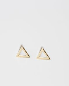 E&E PROJECT 14K SOLID GOLD SERIES ------------------------------------------------------ Basic but necessary! Lightest cute small Triangle earrings. Wear it while showering, swimming all day, everyday All earrings post and backings are 14K Gold 5mm tiny triangle studs / 1 Pair with 14K gold packings --------------------------------------- ■ SHIPPING UPGRADES You can find shipping upgrades options in the drop bar menu when you check out. * Within the U.S Regular First-class : 2-6 business day Minimalist Gold Earrings, Simple Studs, Triangle Stud Earrings, Minimalist Earrings Gold, Triangle Earrings Stud, Triangle Studs, Triangle Earrings, Simple Earrings, Earrings Jewelry