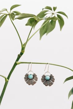 The Amazonite Fan earrings are made of sterling silver and feature an ancient green amazonite gemstone at its center. Simply slip on these one-of-a-kind dangling earrings and feel ready to head out. Handcrafted by artisans in Peru with Manos Amigas, meaning "hands joined in friendship," 20% of profits go to social efforts within their communities: warm meals to 300 children a day, school supplies and uniforms, and a scholarship program for artisans' children to attend university. Amazonite Drop Earrings As Gift, Turquoise Amazonite Nickel-free Jewelry, Nickel-free Turquoise Amazonite Jewelry, Nature-inspired Silver Earrings With Natural Stones, Turquoise Nature-inspired Drop Earrings, Handmade Amazonite Dangle Earrings, Handmade Dangle Amazonite Earrings, Bohemian Amazonite Earrings As Gift, Bohemian Amazonite Earrings For Gifts