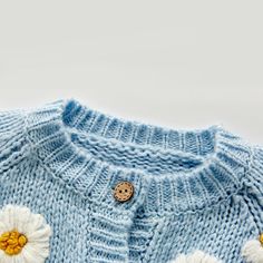 Let your unique style shine with the Daisy Dreams Knitted Cardigan. Its lightweight construction provides superior comfort and flexibility, while its intricate knitwork creates a luxurious look. Style and comfort come together in perfect harmony. Get yours today! Our knitted cardigan is perfect for your little fashionista in all seasons, providing both comfort and style. Made from a blend of cozy woolen yarn, this cardigan is gentle on your baby's delicate skin. The cardigan features a delightfu Baby Jacket, Cozy Cardigan, Girls Wardrobe, Cardigan Top, Girl Coat, Knitted Cardigan, Cute Sweaters