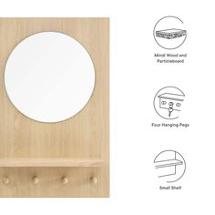 an image of a round mirror on the wall with hooks and knobs around it