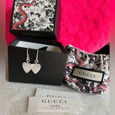 Gucci Heart Silver Dangling Earrings Super Pretty Comes With Box And Dust Bag Gucci Sterling Silver Jewelry With Heart Charm, Gucci Sterling Silver Earrings For Formal Occasions, Gucci Jewelry For Valentine's Day Anniversary, Gucci Jewelry With Heart Charm, Gucci Luxury Sterling Silver Earrings, Gucci Jewelry With Heart Charm As A Gift, Luxury Gucci Sterling Silver Earrings, Gucci White Gold Sterling Silver Earrings, Elegant Gucci Jewelry With Heart Charm