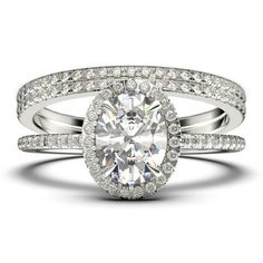 a diamond engagement ring with two rows of pave set diamonds on the band and an oval