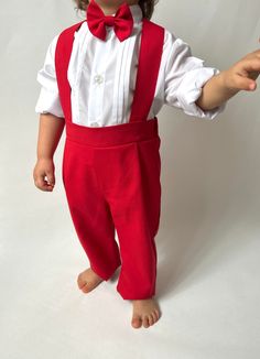 ✿ABOUT THIS SUİT ✓This set includes a long-sleeve white cotton shirt, a red silk alpaca suspenders pants, a silk alpaca vest, and a bow tie. ✓The trousers have an elastic back and adjustable trouser hanger for a comfortable and stylish fit.  ✓The elegant page boy look is perfect for any special occasion, ensuring your little one looks picture-perfect. ✿FABRIC INFORMATION ✓Natural cotton, silk alpaca. ✓Color of your item may vary slightly from what you see on your screen because all monitors disp Formal Cotton Long Sleeve Set, Formal Long Sleeve Cotton Set, Red Cotton Party Bottoms, Elegant Red Cotton Bottoms, Red Sets With Pockets For Spring, Red Sets With Pockets For Summer, Red Summer Sets With Pockets, Red Spring Sets With Pockets, Formal Cotton Sets With Pockets