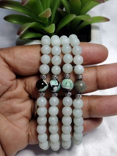 Bohemian Bliss Bracelet with Coral Magnesite Healing Stone, kiwi stone,  and stainless Steel Spacer beads. White Jade Beaded Bracelets In Bohemian Style, Bohemian Jade Crystal Bracelet With 8mm Beads, Healing Stone, Healing Stones, Spacer Beads, Kiwi, Coral, Beaded Bracelets, Healing