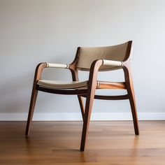 a wooden chair sitting on top of a hard wood floor