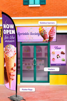 an ice cream shop with two cones on the front and one cone in the middle