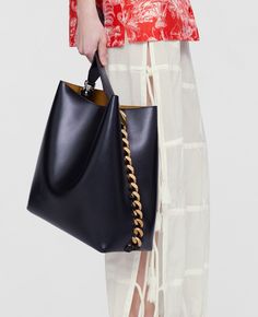 Women Black Frayme Tote Bag | Stella McCartney US Modern Shoulder Bag With Chain Strap For Shopping, Modern Bags With Chain Strap And Double Handle, Modern Tote Bag With Chain Strap, Modern Double Handle Bag With Chain Strap, Modern Chain Shoulder Bag, Modern Everyday Bags With Chain Strap, Shopping Tote Bag With Chain Strap, Designer Top Handle Bag With Chain, Everyday Chain Tote Bag