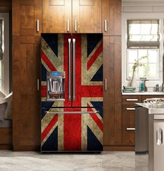 a refrigerator with the flag of great britain painted on it's side in a kitchen