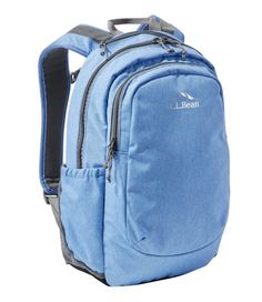 a blue backpack is shown with the word l bean on it