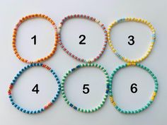 Sunshine all year long!  Choose your favorites from the Sunshine bracelet collection.  Buy one set or a whole stack! These colorful seed bead stretch bracelets will bring joy and life to your wardrobe throughout the year.  Perfect for both wearing and sharing! Order individual bracelets by number.  Each bracelet is labeled with a number.  When you place your order, please give the number/numbers of the bracelets you would like.  Made to Order.  Bracelets will ship within one to three business da Multicolor Friendship Bracelets With Round Beads For Everyday, Multicolor Round Bead Friendship Bracelets For Everyday, Everyday Multicolor Stretch Bracelet With Spacer Beads, Everyday Multicolor Friendship Bracelets With Round Beads, Multicolor Beaded Bracelets With Letter Beads, Multicolor Round Beaded Bracelets With Letter Beads, Colorful Everyday Beaded Bracelets With Round Beads, Multicolor Friendship Bracelets With Letter Beads, Multicolor Friendship Bracelets With Letter And Round Beads