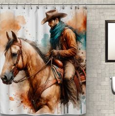 a shower curtain with a painting of a cowboy riding a horse