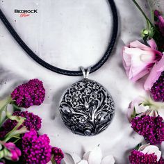 Introducing our exquisite Silver Floral Medallion Pendant, a true testament to timeless beauty and unparalleled craftsmanship. Meticulously crafted using the die-striking method, this pendant showcases intricate floral motifs inspired by a vintage die carved at the turn of the last century. Made from high-quality silver, this pendant exudes elegance and sophistication. The die-striking technique ensures a flawless and durable piece that will last for generations to come. Each detail of the flora Flower Statement Necklace, Cord Necklace, Floral Motifs, Silver Roses, Floral Motif, Timeless Beauty, Silver Necklaces, Vintage Designs, Jewelry Box