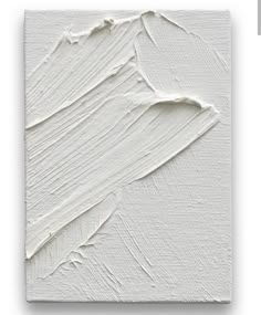 an abstract painting with white paint on the canvas, it looks like there is no image in