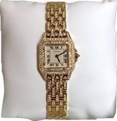 Luxury Gold Cartier Watch, Luxury Yellow Gold Watches For Formal Occasions, Classic Yellow Gold Jewelry For Evening, Designer Gold Cartier Watch, Luxury Round Diamond Watch For Weddings, Timeless Yellow Gold Jewelry And Watches For Formal Occasions, Evening Yellow Gold Diamond Watch With Rectangular Dial, Luxury Brilliant-cut Diamond Watch For Evening, Luxury Gold Watches For Formal Occasions