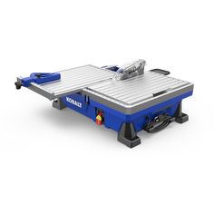 a table saw is sitting on top of a white surface with blue trimmings