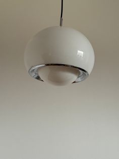 Meblo Guzzini Pendant Light / Vintage  White Ceiling Lamp / Mid-Century Modern Lighting / Home Decor / Italy / 1970s Step back into the stylish 1970s with this iconic ceiling light designed in 1968 by Studio 6G model 3030 for Harvey Guzzini. Crafted in white Plexiglas with an exquisite decorative white metal ring, this hanging lamp exudes midcentury modern charm. Elevate your home decor with this vintage piece that brings a touch of retro elegance to any space, perfect for enhancing kitchen ligh Harvey Guzzini, Mid Century Lighting Pendant, Ceiling Lamp White, Mid Century Modern Lighting, Ceiling Light Design, Kitchen Lamps, Lighting Home, White Ceiling, Mid Century Vintage