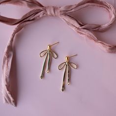 Look stunning this holiday season with these trendy bow earrings! Whether you're dressing up for a special occasion or just going out with friends, you'll be sure to make a statement with their large, bold design. Add some pizzazz to your festive outfit! …………………………………. Details: Bow Pendant is Gold or Silver Plated, measuring 33.4mm x 19mm x 2.4mm Stud is 14k Gold Filled or Sterling Silver Nickel Free About Your Jewelry If you are not wearing your jewelry it is best to store it in a cool, dry pla Trendy Bows, Bow Earrings, Bold Design, Silver Earrings Studs, Outfit Details, Festival Outfits, Ghana, Just Go, Gold Filled