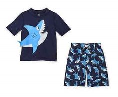 Koala Kids 2-Piece Swimsuit & Rash Guard Set Infant Boy Size 6 Months Fits 12-17 lbs., 24-27" height Navy blue swimsuit with a print of ocean sharks. The rash guard top is navy blue with a large shark printed on the front. It's little tail is sewn on the side. Excellent UPF 50 Sun Protection Brand New with Tags! I ship quickly, the same day or next day. My home is smoke free. Playful Swimwear For Ocean Activities In Summer, Playful Summer Swimwear For Ocean Activities, Playful Summer Swimwear For Beach Activities, Blue Swimwear For Ocean Activities In Summer, Blue Swimwear For Summer Ocean Activities, Blue Swimwear For Beach Season And Ocean Activities, Playful Sets For Pool And Beach Season, Playful Pool Sets For Beach Season, Playful Blue Swimwear For Ocean Activities