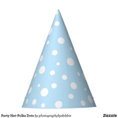 a blue party hat with white polka dots