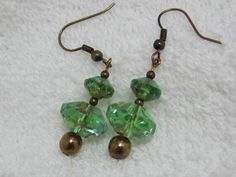 beautiful clear green glass, slightly washed with bronze, with bronze round beads and antique brass metal Antique Brass Metal, Glass Earrings, Brass Metal, Green Glass, Round Beads, Antique Brass, Etsy Earrings, Etsy Accessories, Jewelry Earrings