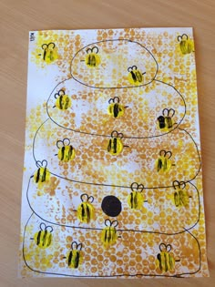 a piece of paper with bees on it