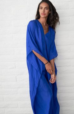 Eco Friendly Cobalt Silk Placket V-Neck Long Caftan | ocean+main Blue Tunic With Kimono Sleeves, Blue Tunic With Kimono Sleeves For Vacation, Blue V-neck Kaftan For Beach Cover-up, Indigo Kaftan For Beach Cover-up, Blue Flowy Tunic Kaftan, Flowy Blue Tunic Kaftan, Blue Caftan, Upcycled Dress, Upcycled Fabric