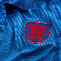 Nike 2020-21 England WOMENS Away Jersey - Blue-Red The England Stadium Away Jersey channels team pride on highly breathable fabric to help keep you cool and dry on the field or in the stands. A classic polo design is amped up with a '90s-inspired distorted Three Lions graphic that embodies the energy of England's next generation. This product is made with at least 75% recycled polyester. Nike Breathe fabric helps you stay dry and cool. Dri-FIT technology helps keep you dry and comfortable. Disto Blue Sporty Polo Shirt With Team Logo, Blue Polo Shirt For Sports Events, Blue Polo Shirt With Team Name For Sports Events, Blue Polo Shirt For Team Events, Team Spirit Blue Polo Shirt For Team Events, Blue Polo Shirt For Sports Season, Sporty Blue Polo Shirt For Sports Season, Blue Sporty Polo Shirt For Sports Season, Three Lions